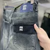 Jeans de diseñador para hombres Primavera Verano Agujero Slim Fit Hombres Mujeres Letras impresas Retro Hip Hop Street Parkour Pantalones deportivos casuales Pantalones para correr