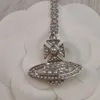 Choker Vivianeism Westwoodisme Collier du collier de perles Saturn avec incrustation personnalisée de petites perles Saturn Chain Collier