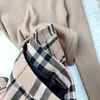 コントラストカラーの格子縞のストライプスカートプリーツ秋のハイウエストの韓国語バージョン