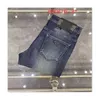 Lyxiga mens designer jeans mens jeans smala fit byxor hög kvalitet triangel logotyp blå jeans små ben byxor vanlig casual classic mångsidig vår hösten män byxor