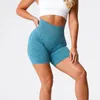 Naadloze shorts van samenpersend Stretchy workouts Korte leggings Fitnessoutfits met ruches Flatterende vorm Gymkleding Borduursel NVGTN 240113