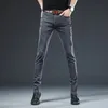 Trendige Herrenbekleidung, schmale schwarze Jeans mit Knöpfen, einfarbig, Stretch-Skateboard, Multibutton, jugendliche männliche Skinny-Denim-Hosen 240113