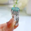 Echte 100% 925 sterling zilveren trouwringen luxe sieraden ronde geslepen smaragdgroene moissanite diamanten edelstenen partij rijke vrouwen verloving lotusbloem ring cadeau