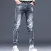 2023 Jeans invernali da uomo Aggiungi pantaloni di lana addensati Pantaloni di jeans da uomo slim vintage blu vintage hip-hop di alta qualità 240113