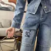 Luxe damesjeans Designerbroek Damesmode gesplitste denimbroek Letterborduurwerk Grafische Jean-broek Losse jeans met grote zakken
