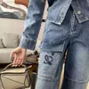 Lüks kadın kot tasarımcı pantolon kadın moda bir eklenmiş denim pantolon mektubu nakış grafik jean pantolon gevşek büyük cep kot pantolon