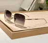 Luxe zonnebril Dahla Gold Metal Frame/Blue Gray Shaded Women Designer Glazen Sonnenbrille Dames Shades Sunnies Gafas de Sol UV400 Eyewear met doos