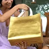 Borse portaoggetti Borsa in tessuto non tessuto di lusso leggero Shopping in pellicola di alluminio placcato Confezione regalo Borsa per negozio di abbigliamento in oro rosa argento