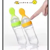 Nuovi biberon # Neonato Bambino Spremere Cucchiaio da alimentazione Bambino Silicone Alimentazione del bambino Bottiglia di frutta vegetale Piatto per bambini Bilancia cucchiaio set di asciugamani