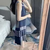 Casual Dresses Preppy Style Navy Blue Grey Patchwork Design ärmlös väst veckad klänning Spring Elegant Women's Sticked O-Neck randig