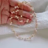TBB12 La pulsera de perlas de gato presenta una textura delicada y un diseño exquisito que la convierte en una pieza impresionante y versátil240115