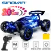 Sinovan télécommande pour enfants 1/18 échelle RC course avec lumières LED 2.4 GHz RC voiture jouets de plein air cadeaux pour garçons filles 240115