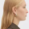 Örhänge örhängen designer för kvinnor 18k guldpläterad båge triangel glansigt ljus med modebrev retro personlighetsstud för festsmycken gåva