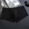 Underbyxor män is silkekonvex påse boxare shorts för unga elastiska underkläder ultratunna trosor pojkens sexiga transparenta gasy sport