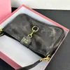 Bolsos de diseñador vintage para mujer, bolso para axila, tendencia callejera, monedero para axila, cierre con cremallera, hebilla, bolso de piel de vaca 231115