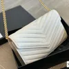 حقيبة مصممة للنساء حقائب حقيبة اليد WOC Caviar Caviar Cawhide Chain ملفوفة مغلف حقيبة الفاخرة المصغرة Crossbody حقيقية من الجلد الأسود الأزياء أكياس الكتف