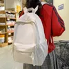 Sacchetti scolastici piccole donne in nylon impermeabili di colori solidi freschi femminile di alta qualità sacca da viaggio leggero da viaggio da viaggio preppy schoolbag