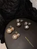 Modische weiße Zirkon-Ohrringe mit großen Perlen für Damen, Herbst/Winter, französischer leichter Luxus-Nischen-High-End-Charme-Schmuck-Trend