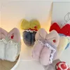 Berretti Paraorecchie invernali Pieghevoli Tendenza moda Accessori per abbigliamento Peluche morbido e confortevole Fiocco caldo