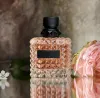 Parfym Fragrance Woman Charming 100 ml EDP Spray Köln Brand kvinnlig naturlig långvarig Pleasant Flower Note Scent för gåva 3.4 fl.oz grossist