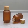 Bottiglie di stoccaggio 20 pezzi Bottiglia vuota cosmetica riutilizzabile marrone Emulsione di plastica Imballaggio con contenitore per lozione fai-da-te con tappo in bambù