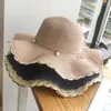 Chapeaux à bord large chapeau de paille de mode coréen pour femmes en été pliable pliable de bonnet de bonnet de seau pour les dames élégantes de voyage en plein air