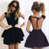 Sexig öppen baksida Little Black Homecoming Dresses 2024 Cap Sleeve Mini Party Dress Billiga Short Prom Cocktail klänningar Evening Formal Wear