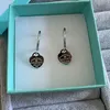 Lovely Girls Оригинальный дизайнерский дизайнерский брендовый сердце Diamond T Hoops 316L из нержавеющей стали 18 тыс. Золотая серебряная роза Женщины 925 Гравные серьги свадебная вечеринка ювелирные изделия