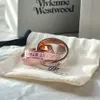 bijoux vivianeism westwoodisme anneaux légers luxe de style punk personnalisé lettre à trois anneaux dynamique Ring Couple