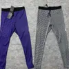 Pantaloni Calzamaglia sportiva pro combattimento basket pantaloni elastici da palestra da uomo Calzamaglia fitness da uomo abbigliamento sportivo compressione da corsa ad asciugatura rapida PALESTRA jogge