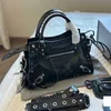 Sac de moto en cuir véritable femmes luxe mode épaule Cool fille bandoulière noir argent rouge blanc sacs sac à main femmes 240115