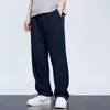 Calças masculinas com bolso de malha solta adequada para roupas casuais de cordão de fundo reto streetwear treino