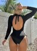 Swim Wear Peachtan Black Sportowe stroje kąpielowe kobiety 2023 Koreańskie stroje kąpielowe Długie rękaw One Piece Swimsuit Kobiet Kontrola brzucha na plażę na plażę Girll240115