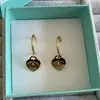 Lovely Girls Оригинальный дизайнерский дизайнерский брендовый сердце Diamond T Hoops 316L из нержавеющей стали 18 тыс. Золотая серебряная роза Женщины 925 Гравные серьги свадебная вечеринка ювелирные изделия