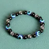 Charme Armbänder 10 stücke 8mm 10mm Blau Tigerauge Schwarz Hämatit Armband Farbige Glasur Böse Perlen Strang für Frauen Männer Schmuck