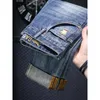 Mäns jeans byxor smalmonterade liten rak modegata 2024 stretchvattentvätt broderibyxor