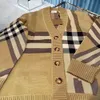 Suéter de los hombres Suéteres de diseñador para mujer para hombre Moda Empalme Rayas High Street Camisa a cuadros Casual Chaqueta de rebeca suelta Botones con cuello en V Suéter de lana