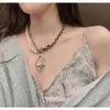 Gioielli di Fashion Channel Nuova piccola catena profumata di osso di serpente geometrico gancio per l'acqua fiore C collana hip hop nera da donna della famiglia