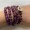 Braccialetti con ciondoli Cristalli di quarzo viola naturale Pietra 108 Collana di perline Mala Bracciale buddista tibetano elastico 8mm Simbolo OM Terra