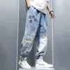 Graffiti impression jean hommes dégradé Hip Hop pantalon Harem dessin animé lâche décontracté cheville pantalon à bandes Cargo Denim jean pour hommes 240115