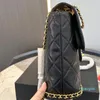 Varumärkekedja ryggsäck axelväska designer kvinnor väska luxurys designer ryggsäck cool och stilig ryggsäck guld läderkedja spegel kvalitet