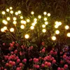 Lampes à gazon Le jardin solaire allume la lumière oscillante solaire par le vent lumières extérieures 10LED pour la décoration de Patio de cour blanc chaud YQ240116