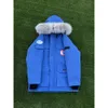 Designer Canada Poche à capuche Vestes d'oie Hommes Vêtements d'extérieur Mode Doudoune Manteau Casual Zipper Badges Vêtements d'hiver en plein air de haute qualité R134