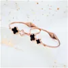 Bijoux de mode pour femmes Accessoires cadeaux Élastique Ouvert et fermé Coquille en or 18 carats en acier inoxydable Bracelet trèfle à quatre feuilles Drop Deliver Dhsxh