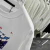 T-shirt de styliste pour femmes, vêtements de marque pour femmes, hauts d'été, mode graffiti logo imprimé, chemise à col rond pour dames, 16 janvier
