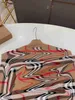 럭셔리 여자 판초 골드 지퍼 장식 아이 디자이너 옷 크기 90-160 니트 디자인 어린이 코트 체크 체크 재킷 Jan10