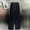 Pantaloni neri con stampa di lettere classiche primavera estate Pantaloni classici per il tempo libero versione allentata a vita alta dello stesso stile