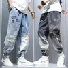 Graffiti impression jean hommes dégradé Hip Hop pantalon Harem dessin animé lâche décontracté cheville pantalon à bandes Cargo Denim jean pour hommes 240115