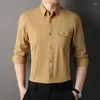 Camicie eleganti da uomo Abbigliamento di alta qualità Camicia a maniche lunghe casual da lavoro in tinta unita Abbigliamento formale in cotone M-4XL Allentato