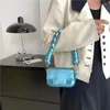 حقائب سهرة أعلى العلامة التجارية النساء الصغيرة الكتف 2024 ليزر جلود صغيرة مصممة مصممة حقيبة يد رفاهية ليدي ليدي ليدي حقيبة واحدة